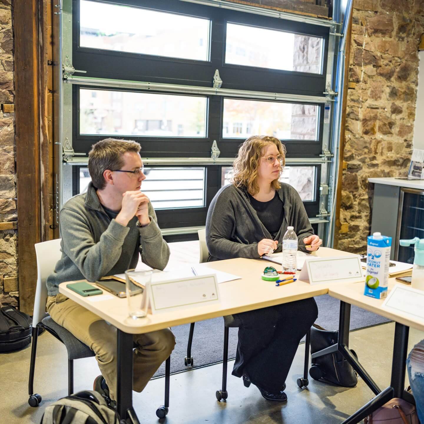 CO.STARTERS Bootcamp participants listening to discussion